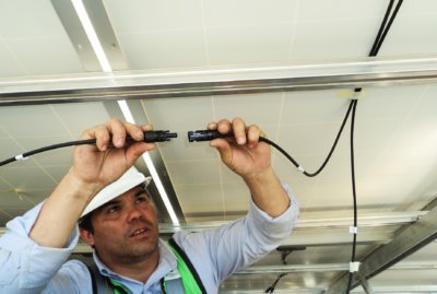 Technician connecting cables