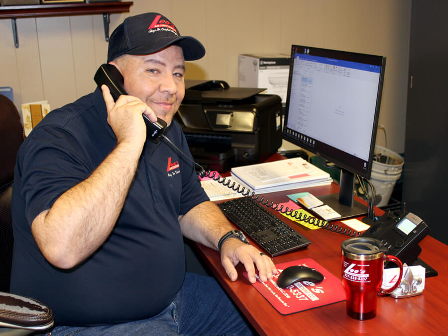 Lee's AC HVAC Technician on Phone with Customer