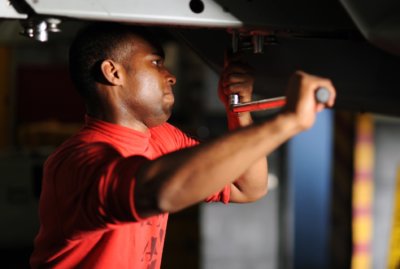 Man making repairs with tools maintenance