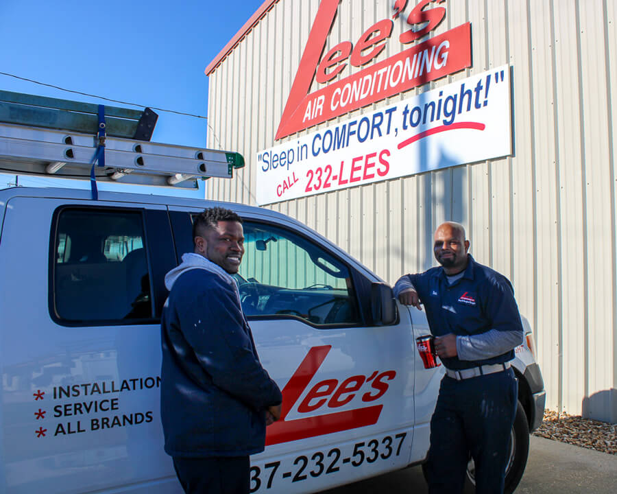 Lee's HVAC Technicians by Company Truck