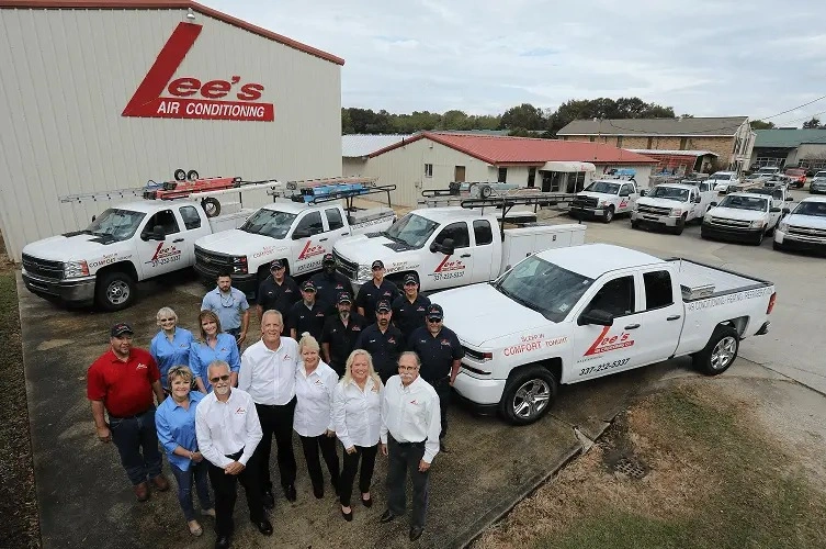 Lee’s heating repair team standing in front of the shop.